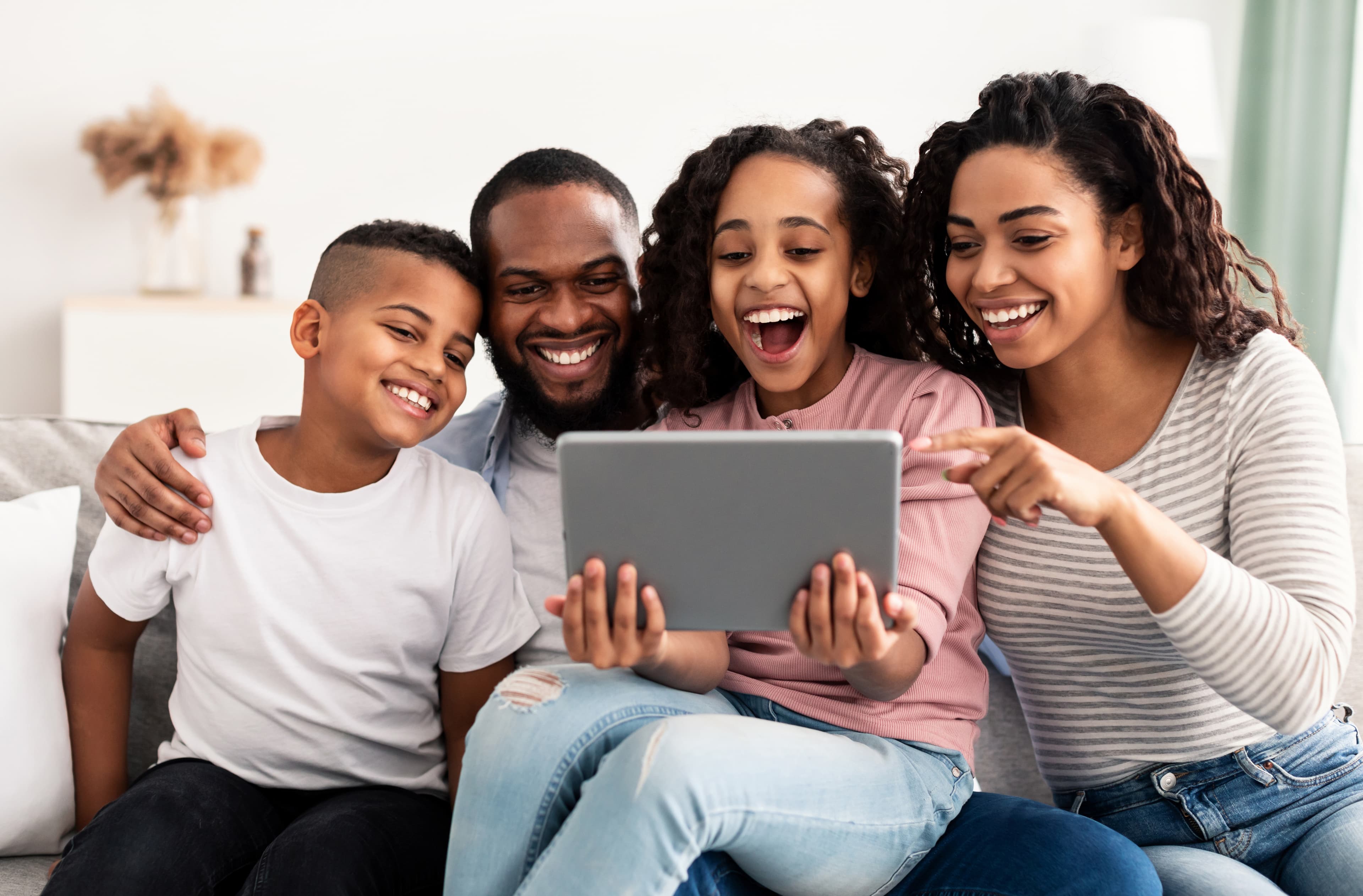 Family browsing on tablet